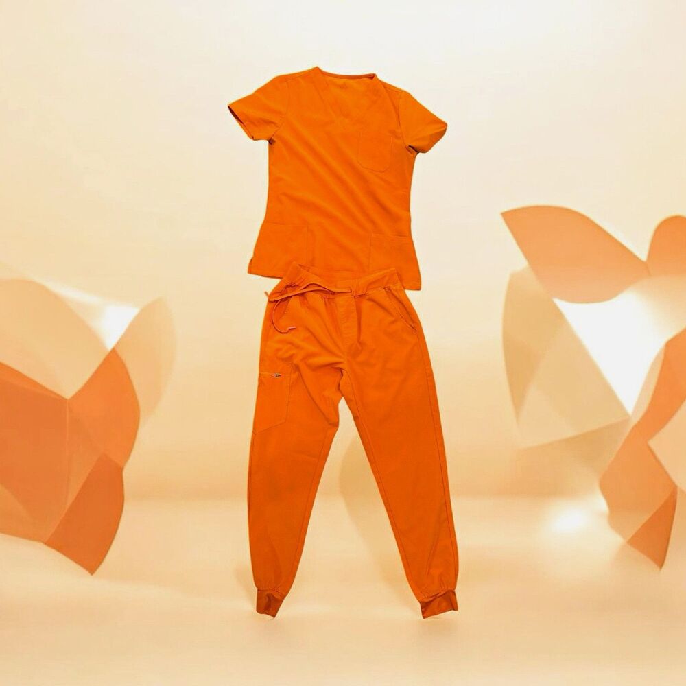 Women’s Orange Solid Scrub Set Crew Neck Short Sleeve Tee & Jogger Pants